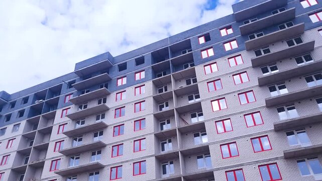 Construction of a brick apartment building. Construction of a residential building or urban structure on a construction site. Installation, real estate construction by a developer, and work performed 