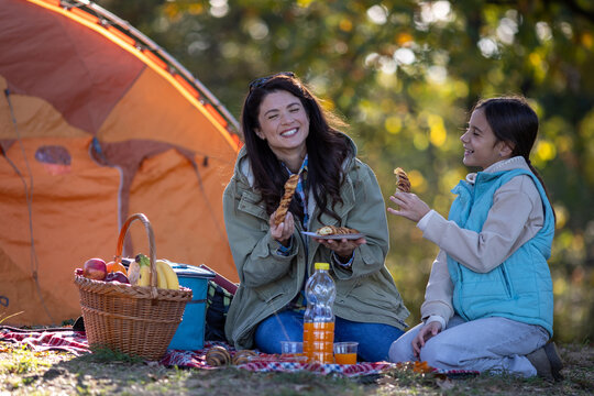 Familiy enjoying picnic in the park