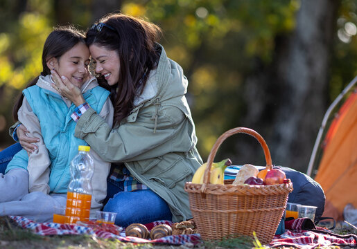 Familiy enjoying picnic in the park