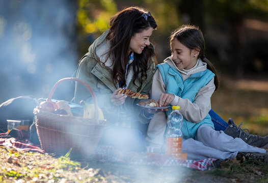 Familiy enjoying picnic in the park