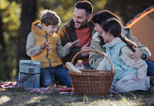 Familiy enjoying picnic in the park