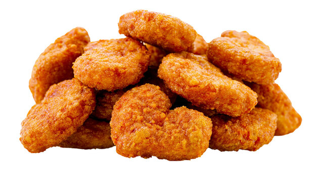 Isolated pile of crispy golden chicken nuggets ready for a delicious fast food snack.