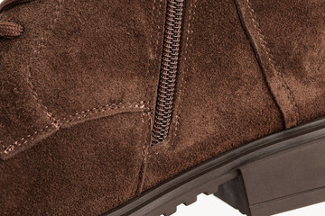 beige suede sports-style winter boots, isolated on a white background