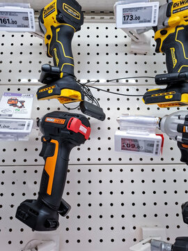 Denia, Spain - October 10, 2025. WORX and DeWalt impact drivers on display at a hardware store in Spain
