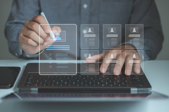 Businessman using laptop review digital recruitment checklist with candidate selection interface, HR evaluation, talent screening and workforce management, online hiring process, employee assessment.