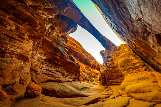 Surprise Arch spans secluded sandstone canyon in Fiery Furnace