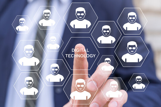 Businessman using virtual touchscreen presses the text DIGITAL TECHNOLOGY. Concept of digital technology background. Digital Tech.