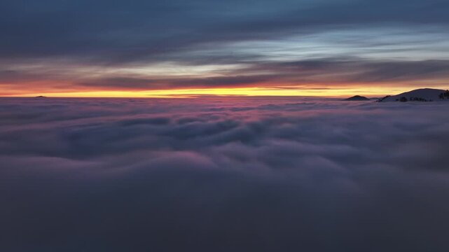 Dreamy flight over sea of clouds, real drone footage, beautiful colours, feels like heaven
