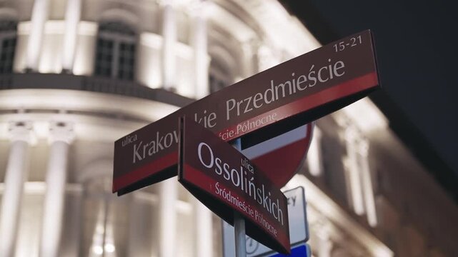 Nighttime Direction Sign on Krakowskie Przedmie&Aring;&rsaquo;cie, Warsaw Historic Street