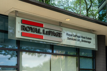 Obraz premium Toronto, Ontario, Canada - September 16, 2026: An exterior sign on the building for Royal LePage Real Estate Services branch in Toronto, Canada. Royal LePage is a Canadian real estate franchiser. 