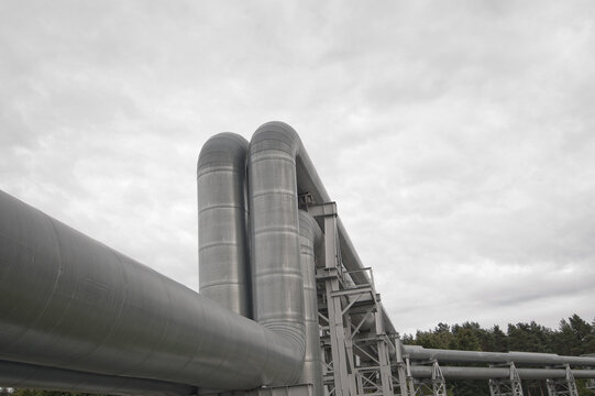 close-up of a pipeline against a gray sky