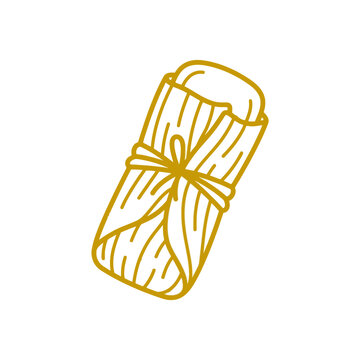 Traditional Mexican tamale wrapped in natural corn husk.
