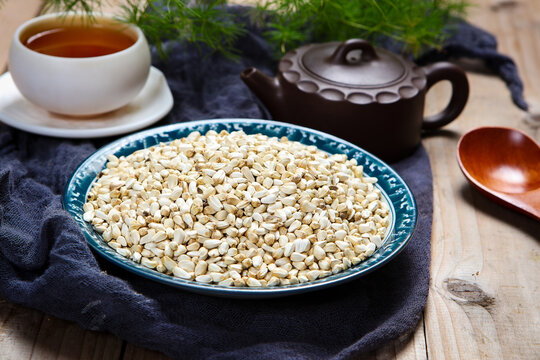 Dried Safflower Seeds in Wooden Bowl Herbal Tea Scene