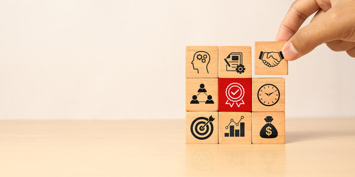 Business process management, Businessman plan a project with wooden blocks with icon business strategy on gray background