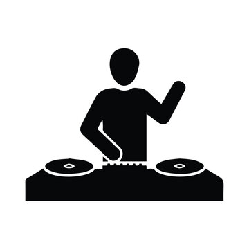Dj playing music on turntables at a party.