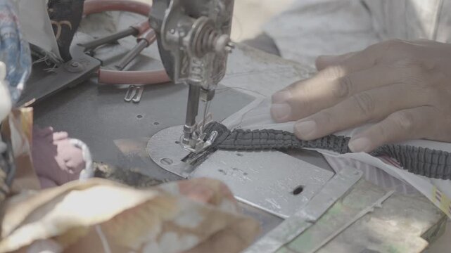 Fabric Being Sewn With Traditional Sewing Machine