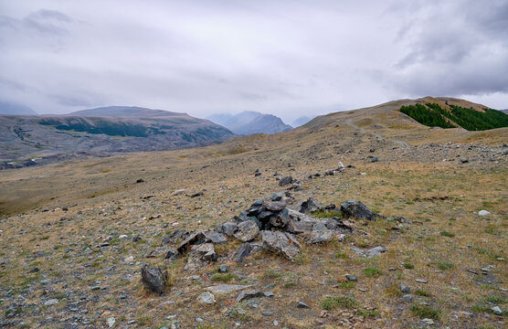 Dramatic view on wild altai mountains. In the background is the valley of the Akkol River.
