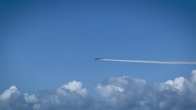 Vintage Warbird Airplane Flying with Smoke Trails at Gold Coast Air Show