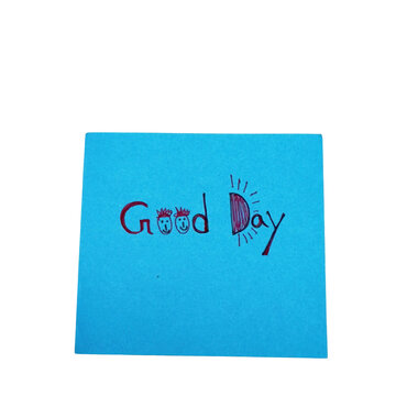 Blue sticky note with hand-drawn good day text and sun isolated on a transparent background