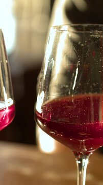 Row of Red Wine Glasses in Cellar Setting