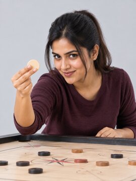 Young Indian Woman Playing Carrom with Coins