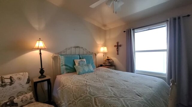 Cozy bedroom interior with bed and window