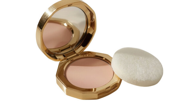 Open gold compact makeup powder case with applicator sponge and blush powder displayed on a neutral background.