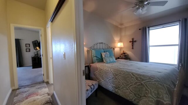 Warm hallway view into kitchen and bedroom doorway