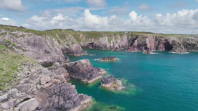 Cliffs over Porthclais from a drone, St Davids, Haverfordwest, Wales, England, United Kingdom