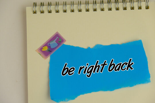  text of BE RIGHT BACK on blue background as a memo or message concept