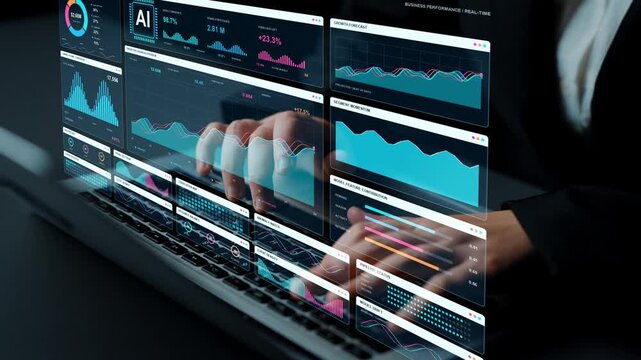 Hands type on a laptop. Business intelligence combines revenue composition and cohort analysis with AI forecasts, offering several views of performance and emerging data changes.