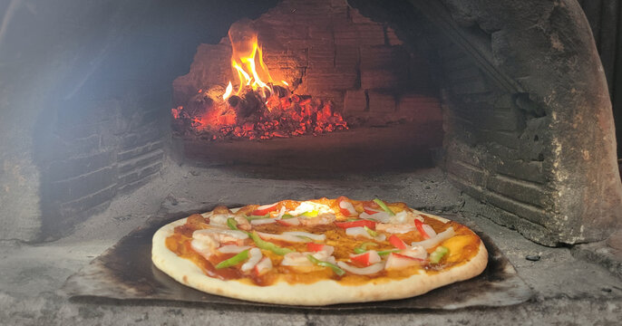 Pizza charcoal mud oven