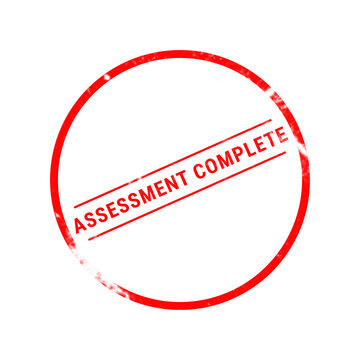 A bright red circular rubber stamp graphic featuring the text assessment complete centered inside the circle on a plain white background surface