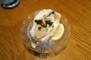 Close up fresh oysters on Sushi bar © chettarin