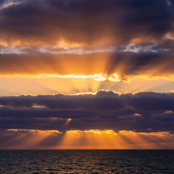 Layered Stratus Clouds over Calm Ocean