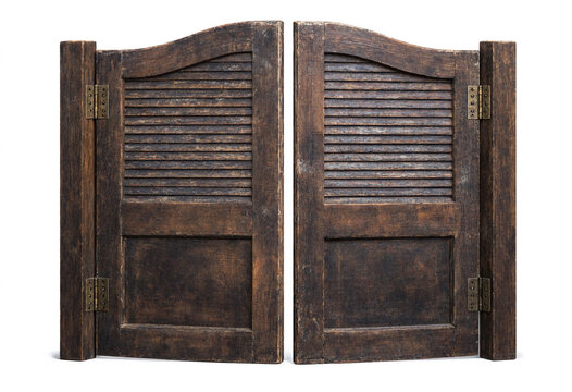 Vintage wooden saloon doors with horizontal slats and brass hinges, classic western style swinging doors isolated on white background