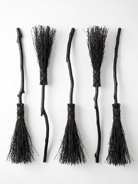 Set Of Five Black Witch Brooms Isolated On White Background