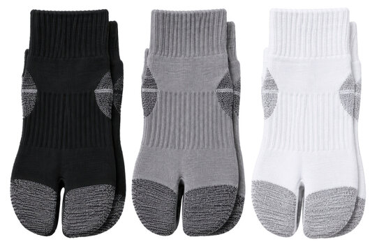 Unisex athletic tabi sock three-pack, performance knit, black, grey and white, split toe and reinforced heel. Flat lay isolated on white background for hosiery retail.
