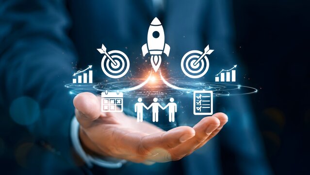 Businessman Holding Holographic Business Icons and Rocket Launch for Startup