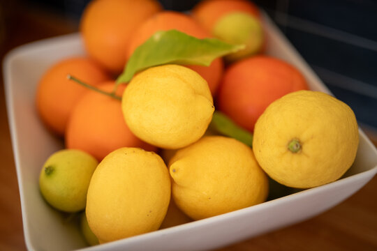 Fresh Citrus Fruits Displayed White Bowl