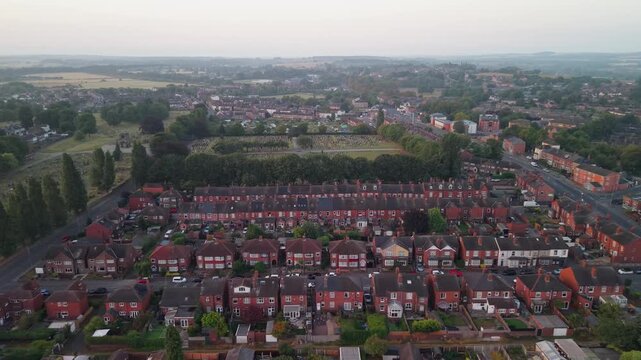 Aerial view of Wakefield, a cathedral city located on the River Calder in West Yorkshire, England, United Kingdom. Drone POV exploration of city centre and surrounding infrastructure in early mornings