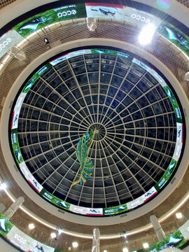 Minsk, Belarus. May 15, 2026. Shopping mall glass dome with circular ECCO advertising screens