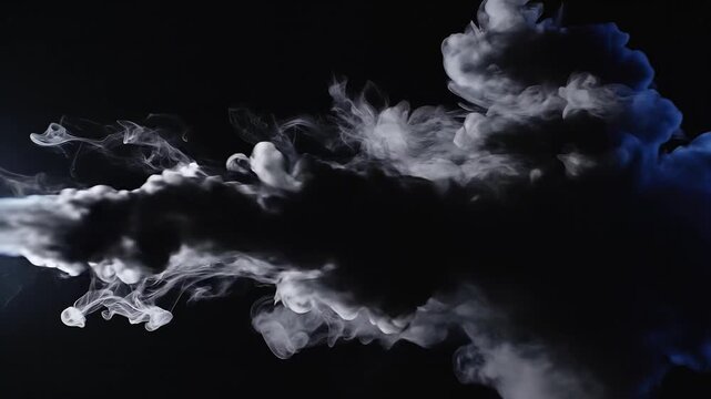 White smoke stream puffing and expanding slowly against a dark background in studio