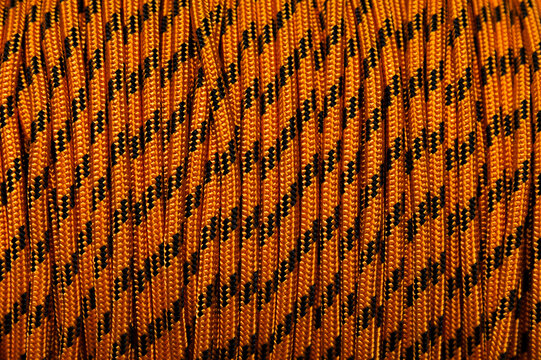 Orange and black nylon cord close up
