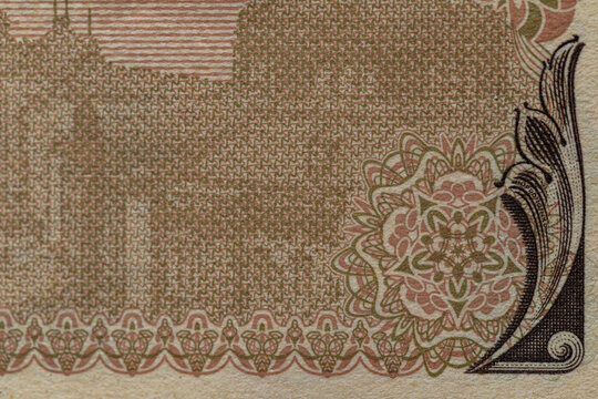 Japanese 10000 yen banknote background pattern macro close up with Guilloche rosette and security border