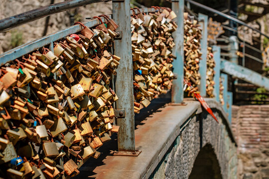 Many locks on a bridge symbolizing wedding and love