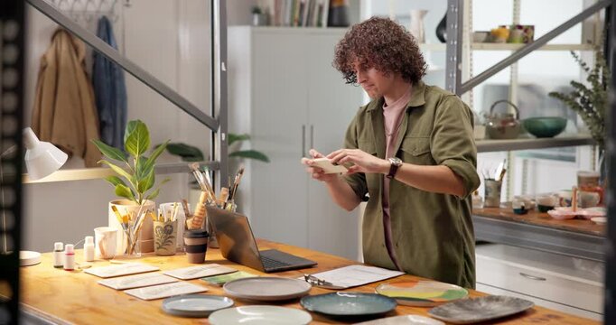 Pottery, phone and man in shop with picture, product marketing and collection launch for startup. Creative, ads and owner with tech, brand photography and ecommerce catalog for ceramic business.