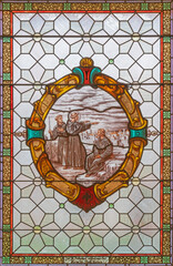 Fototapeta premium Vienna - The St. Anthony of Padua benedicted the city Padua on the stained glass of church Alserkirche by Franz Gotzer from 20. cent.