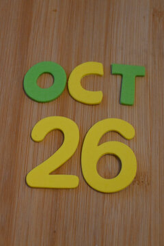 October 26 date display on a wooden surface