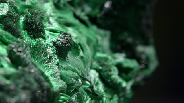 Malachite (green copper carbonate hydroxide) Fibrous chatoyant form giving cat's eye effect